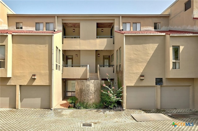 view of property featuring a garage