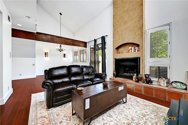 living room with high vaulted ceiling, wood-type flooring, and a fireplace