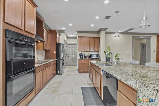 kitchen with visible vents, a sink, ventilation hood, light stone countertops, and black appliances