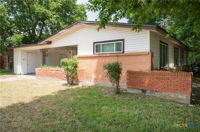 view of property exterior with a yard