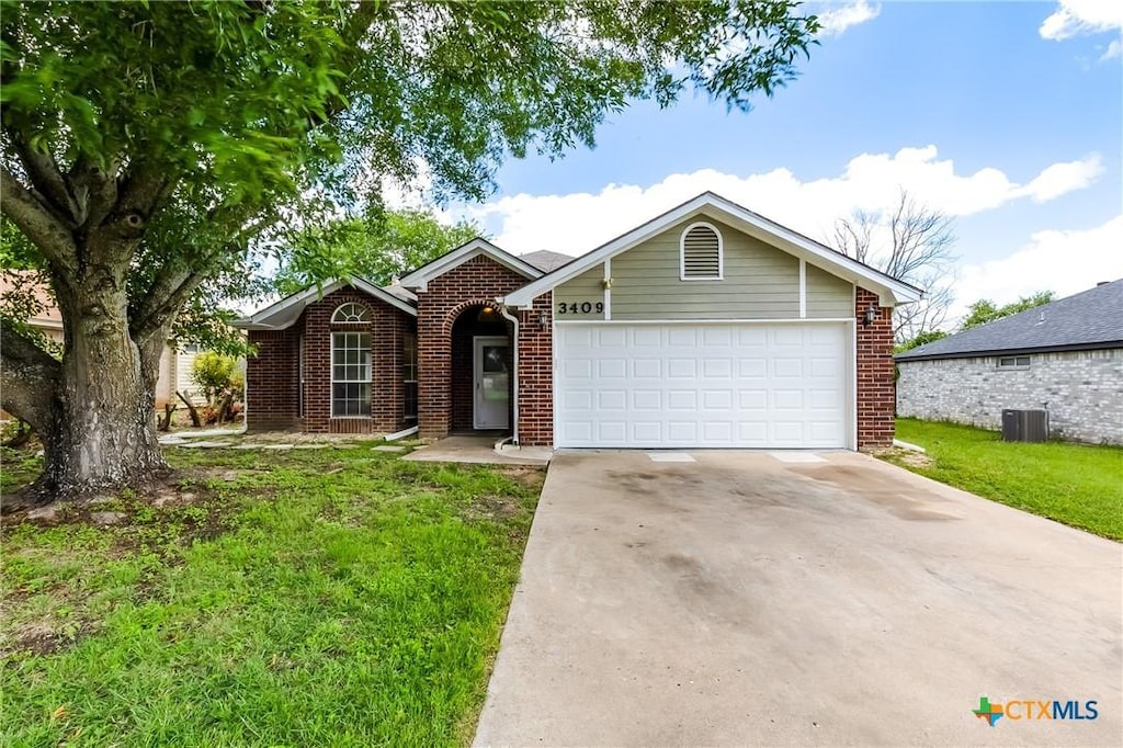 3409 Bamboo Ln, Killeen, TX 76549 - ranch-style house featuring brick siding, a garage, concrete driveway, and central AC unit
