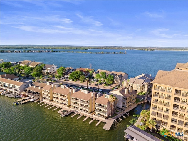 bird's eye view featuring a water view and a residential view