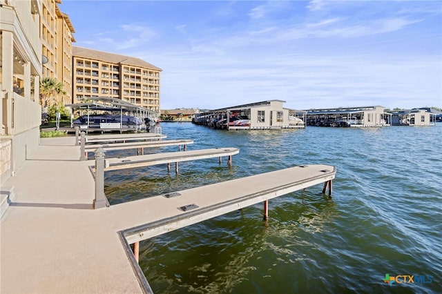 view of dock with a water view