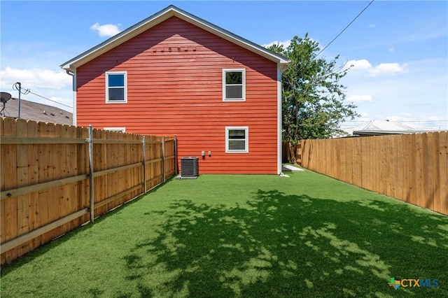 1011 S 26th St, Temple, TX 76501 - rear view of property with central AC