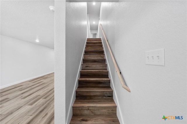 1011 S 26th St, Temple, TX 76501 - stairs with wood finished floors and recessed lighting