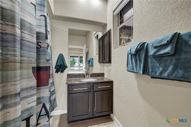2919 Colleen Dr, Canyon Lake, TX 78133 - full bath with vanity, a shower with shower curtain, and a textured wall