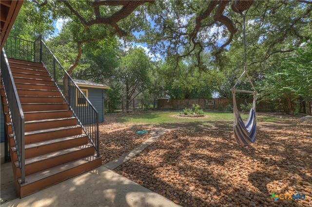 2919 Colleen Dr, Canyon Lake, TX 78133 - view of yard with stairway and a fenced backyard