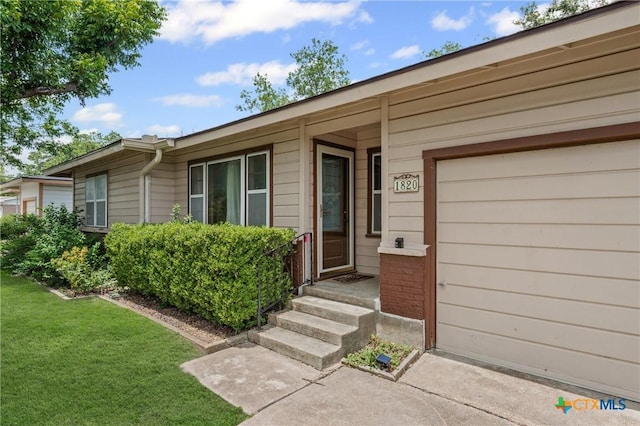 1820 S 49th St, Temple, TX 76504 - property entrance with a lawn