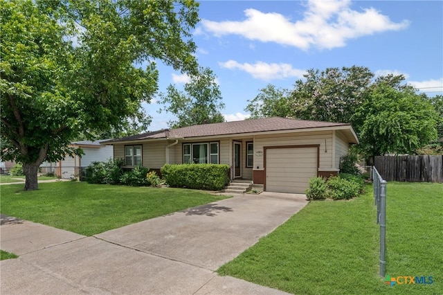 1820 S 49th St, Temple, TX 76504 - ranch-style house featuring a garage and driveway