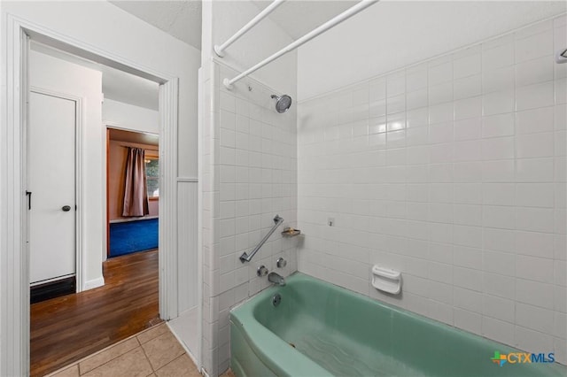 1820 S 49th St, Temple, TX 76504 - bathroom with tub / shower combination and tile patterned floors