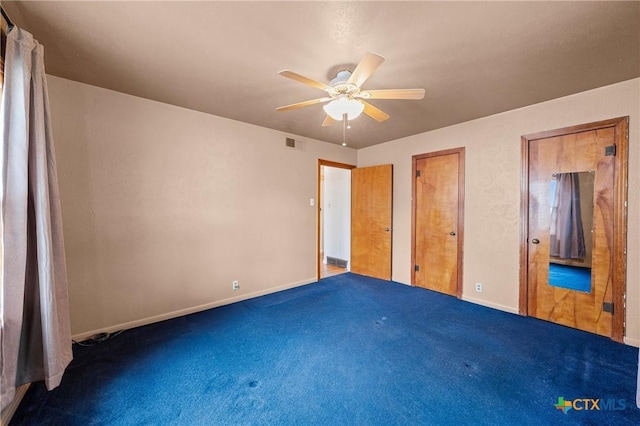 1820 S 49th St, Temple, TX 76504 - unfurnished bedroom with carpet, ceiling fan, and connected bathroom