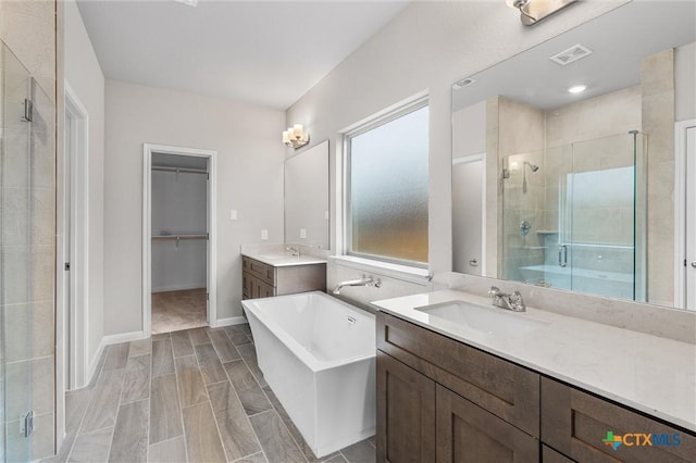 416 Stellar Wind Dr, Georgetown, TX 78628 - bathroom with vanity and separate shower and tub