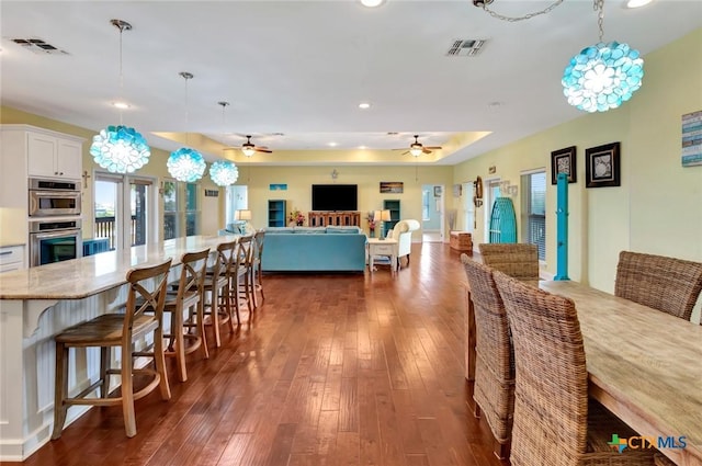 dining area with recessed lighting, visible vents, a ceiling fan, and dark wood-style flooring