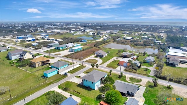 aerial view with a residential view and a water view