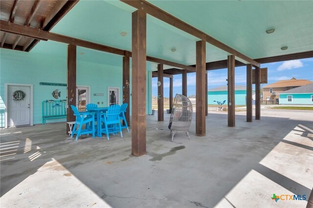 view of patio featuring outdoor dining area