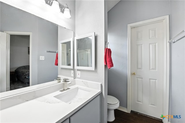 604 Totem Trl, Harker Heights, TX 76548 - full bathroom featuring vanity and wood finished floors