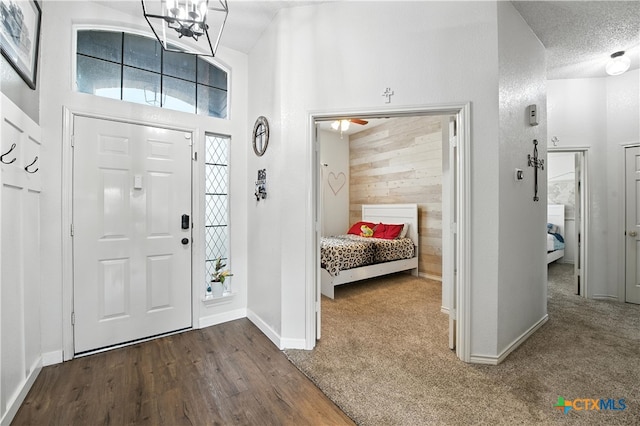604 Totem Trl, Harker Heights, TX 76548 - foyer entrance featuring wood finished floors, a high ceiling, and a chandelier