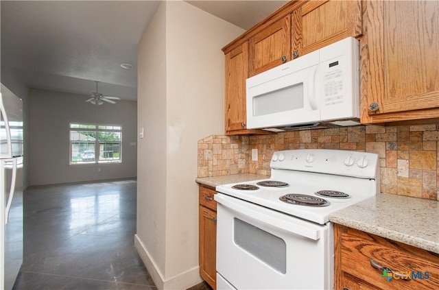 1219 Honor Ln, Temple, TX 76501 - kitchen featuring white appliances, brown cabinetry, decorative backsplash, baseboards, and ceiling fan