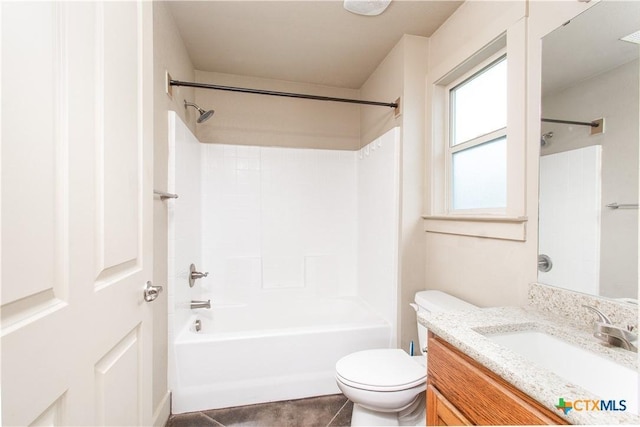 1219 Honor Ln, Temple, TX 76501 - full bathroom with vanity, toilet, tile patterned flooring, and shower / washtub combination