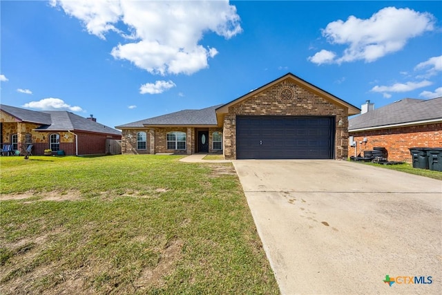 3704 Dewitt County Ct, Killeen, TX 76549 - ranch-style home featuring an attached garage, concrete driveway, brick siding, and a front yard