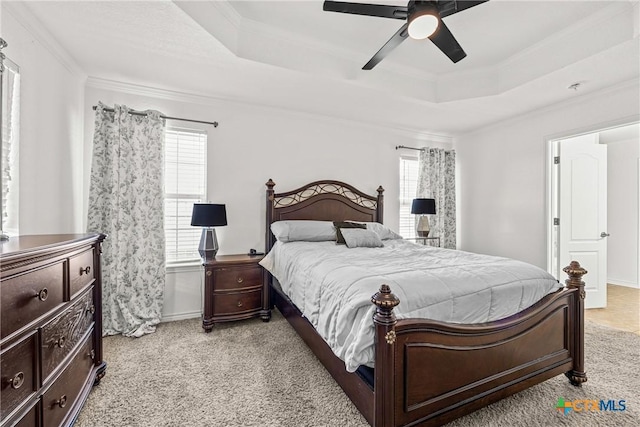 3704 Dewitt County Ct, Killeen, TX 76549 - bedroom featuring a raised ceiling, light carpet, ornamental molding, ceiling fan, and baseboards