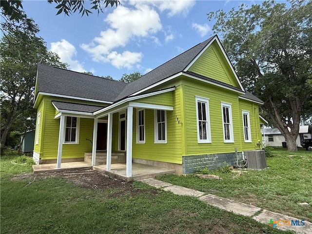 184 3rd St, Maxwell, TX 78656 - back of house featuring a yard and roof with shingles