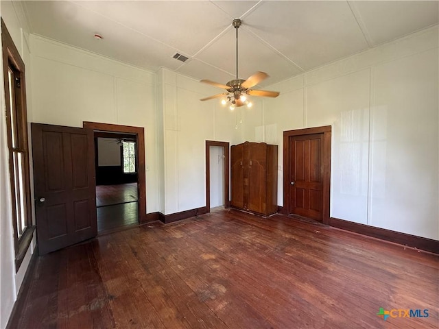 184 3rd St, Maxwell, TX 78656 - unfurnished bedroom featuring hardwood / wood-style floors and a ceiling fan