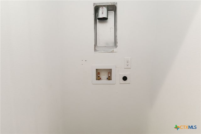 laundry area with hookup for an electric dryer and hookup for a washing machine