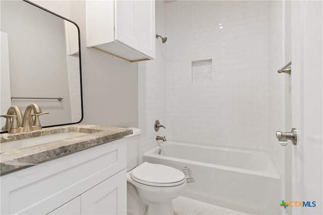 full bathroom with vanity, toilet, and tiled shower / bath combo