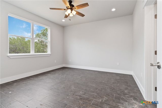 unfurnished room featuring ceiling fan