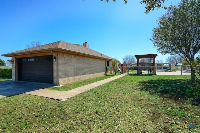 view of property exterior featuring a yard, brick siding, a garage, and fence