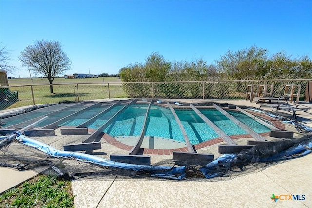 view of pool featuring a fenced in pool and fence