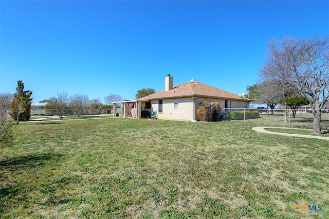 view of yard with fence