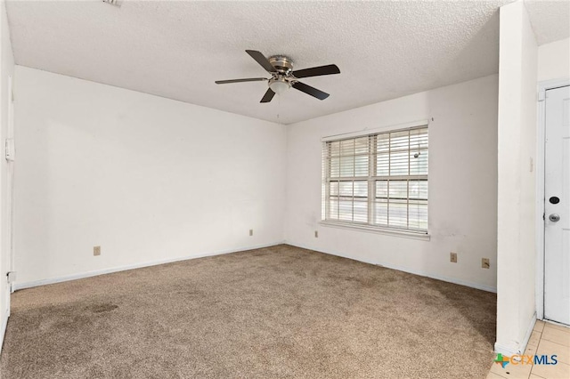 2301 Dover Rd, Killeen, TX 76543 - unfurnished room with ceiling fan, light colored carpet, a textured ceiling, and baseboards