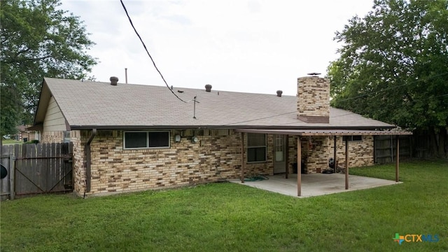 2301 Dover Rd, Killeen, TX 76543 - rear view of property featuring a patio area, a shingled roof, a chimney, and brick siding