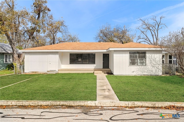 ranch-style house with a front yard