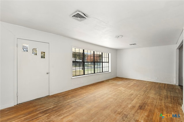 interior space with hardwood / wood-style floors