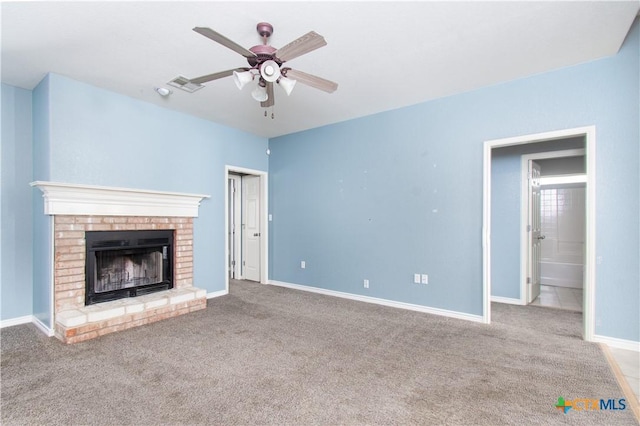 5204 Southern Crossing Dr, Temple, TX 76502 - unfurnished living room with a ceiling fan, carpet, a brick fireplace, and baseboards