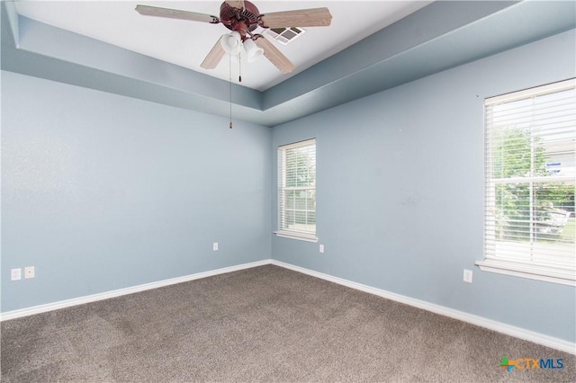 5204 Southern Crossing Dr, Temple, TX 76502 - carpeted empty room featuring baseboards, ceiling fan, and a raised ceiling