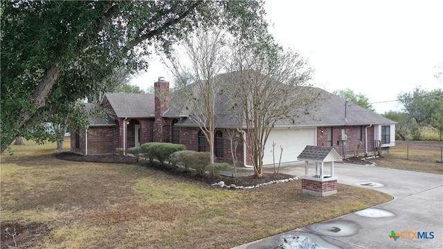 ranch-style house with a front lawn and a garage