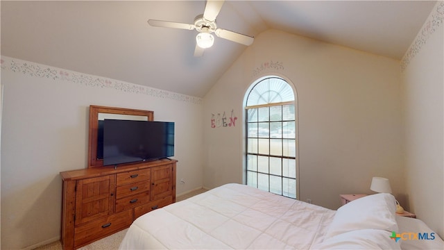 carpeted bedroom featuring ceiling fan and lofted ceiling