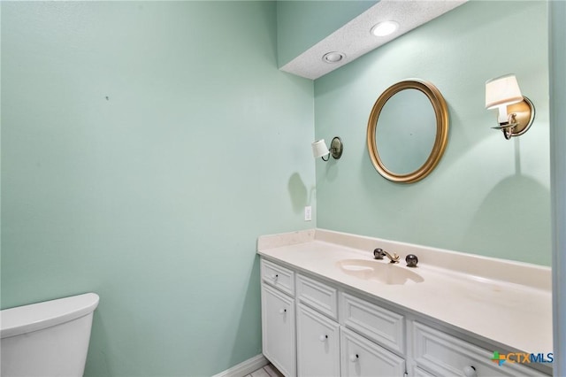 6013 Country Club Dr, Victoria, TX 77904 - half bathroom with vanity and toilet