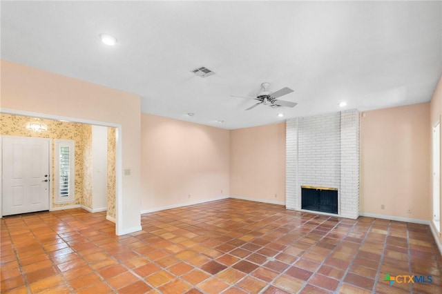 6013 Country Club Dr, Victoria, TX 77904 - unfurnished living room with a ceiling fan, tile patterned flooring, a brick fireplace, and recessed lighting