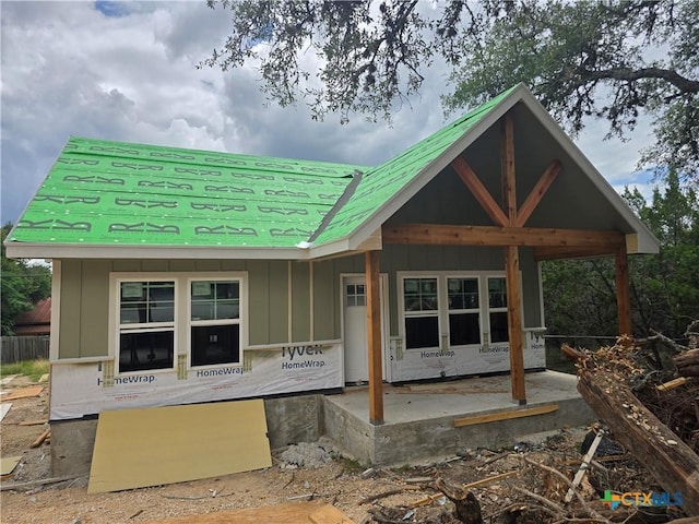 282 Lighthouse, Canyon Lake, TX 78133 - rear view of property with board and batten siding
