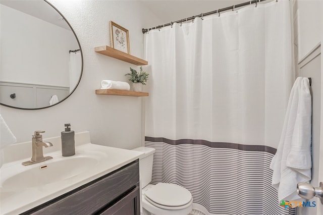 506 Old Peak Rd, Georgetown, TX 78626 - full bath with vanity, toilet, and a shower with curtain