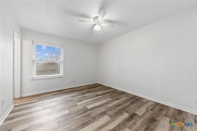 unfurnished room with ceiling fan and light hardwood / wood-style flooring