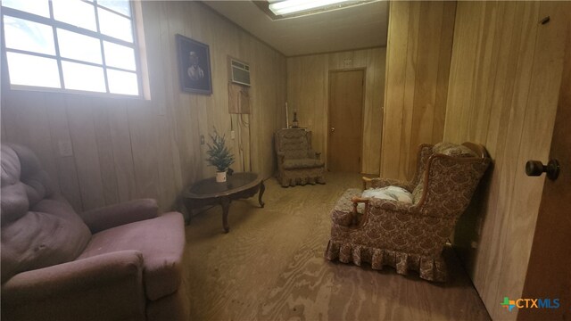 sitting room with wooden walls