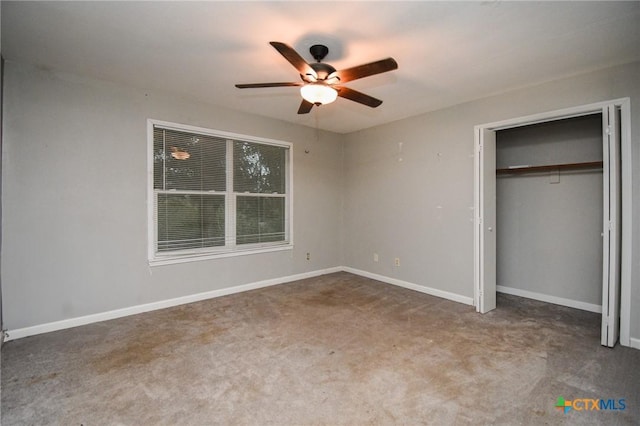 unfurnished bedroom with ceiling fan, carpet floors, and a closet