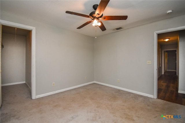 unfurnished bedroom featuring a closet, ceiling fan, and carpet floors