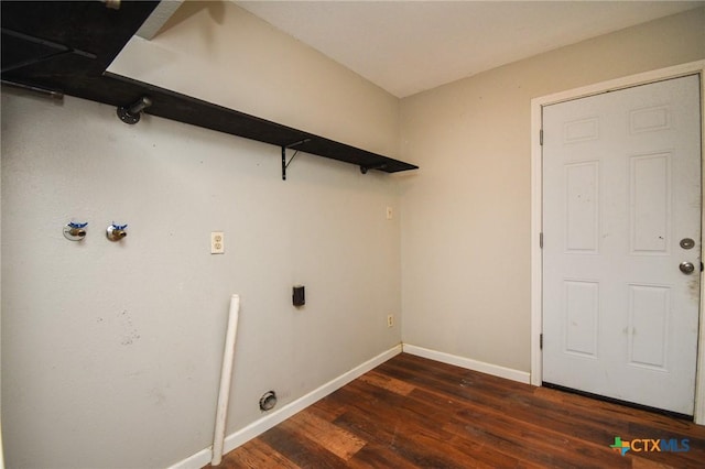 laundry area with dark hardwood / wood-style flooring and hookup for an electric dryer